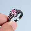 Fedi nuziali Anello da principessa femminile di lusso in pietra ovale rosa Anello vintage in oro nero grande per le donne Promessa di fidanzamento d'amore