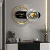 Horloges murales Lumière Luxe Horloge en métal Moderne Minimaliste Personnalité Mode Salon Décoration de la maison avec lampe