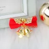 Decorações de Natal 100pcslot Wholesale Mini Jingle Bell com Ornamentos de árvore do Bowknot Acessórios DIY para 220921