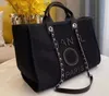 50% rabatt på clearance-försäljning Ny designer handväskor Pearl Beach Bag Canvas Portable High-Capacity Fashion Trend Women Bags Model 542