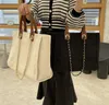 Mulheres bolsas de luxo designer praia saco moda tricô bolsa ombro grande tote com corrente ouro lona saco compras c230325