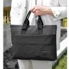 Briefcases Four Seasons Men's And Women's Leisure Solid Color Briefcase Fashionable Zipper Multifunctional Strapless Computer