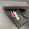 سلسلة مفاتيح المفاتيح الفولاذ المقاوم للصدأ هدية تحفيزية Flamingo Keychain أبدًا