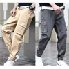 Pantalon masculin Streetwear Casual Men Ribbons Harem Jogging Male Slim Fit Spring Cargo Multi-Pockets Femmes Tableau X94