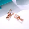 Boucles d'oreilles en forme de double u en or 18 carats pour femmes