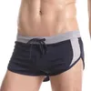 Menas de banho masculinas Sexy mass de cintura baixa shorts divididos esportes de corrida de corrida masculino macacão respirável academia gym g string calças j220913