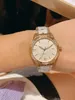 New Women Quartz Wristwatch Stainless Steel Geometric Letter Zircon Watch Female White Ceramic Strap Roman Number Watches Natural Mother of Pearl Dial 33mm