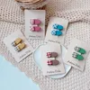 1 paio di mollette ovali per bambini di nuova moda coreana Sweet Girl Baby Simple Cute Plaid Fabric Button Hairpin Hair Accessories