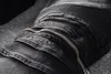 Yeni erkek kot pantolon lüks tasarımcı kot pantolon sıska fermuar siyah mavi diz büyü deri yorgan yırtık delik moda yok