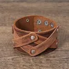 Bloque de cuero Brazalete cruzado Brazalete Botón ancho Pulsera ajustable Muñequera para hombres Mujeres Joyería de moda