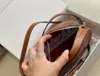 Lüks TRIOMPHES yuvarlak mini çanta Tasarımcı celins Oval Cüzdan Pürüzsüz Dana derisi en kaliteli Crossbody deri kadın erkek çanta poşet çanta debriyaj omuz çantaları