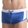 Menas de banho masculinas Sexy mass de cintura baixa shorts divididos esportes de corrida de corrida masculino macacão respirável academia gym g string calças j220913