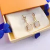 Stud acier inoxydable femmes Designer Double lettre luxe géométrique cristal en forme de coeur Couple boucles d'oreilles pour dame fête mariage