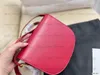 Kvinnors designer lyxiga sadlar tygväska läder handväskor märke crossbody metall skylt koppling axelväskor