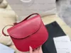 Kvinnors designer lyxiga sadlar tygväska läder handväskor märke crossbody metall skylt koppling axelväskor