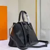 Bolsos de noche Bolso de mano de gran capacidad Bolsos de compras de hombro Ahueca hacia fuera Impresión de letras Moda Mujer Asa trenzada Bolsos de cuero con doble borla Monedero