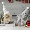 Weihnachtsmann-Dekorationen mit Hüten und gesichtslosen Gold- und Silberpuppen, kreative stehende Desktop-Ornamente