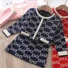 Nuovi vestiti invernali per ragazze T-shirt e gonna a maniche lunghe a pois circolari Due pezzi Abbigliamento per bambini primavera Set maglione lavorato a maglia per ragazze