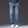 Jeans para hombre Otoño Primavera Marca Recta Suelta Elástico Denim Clásico Negocios Casual Moda joven Mediados de cintura alta 220923