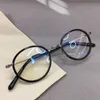 Anteojos ópticos para hombres y mujeres Retro GMS 116 Estilo Anti-Blue Light Lens Plate Marco de titanio con caja