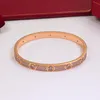 Mode roestvrijstalen heren goud armbanden Eeuwige liefde armband Designer sieraden voor heren vrouwen volledige diamantbangle zilveren geschenken dames luxe liefde