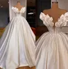 Grazioso abito da sposa con perle fiori fatti a mano volant abiti da sposa in rilievo senza maniche lunghezza del pavimento abito da sposa