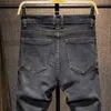 Jeans da uomo di marca di fascia alta Harem Matita Autunno Inverno Moda Tutti i fiammiferi Pantaloni in denim Maschio Blu Nero Grigio Pantaloni spessi 220923