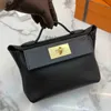 Женские сумки подлинные кожаные пельмени Pochette Bags 2424 голова кожаное крыло кроссовое плечо сумочка двойное плечо