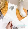 2022 Stövlar Kvinnor Designer Platform Roman Boot Round Toe Tjock hackad Sole Slip on Snow Booties Rain Boots