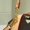 Kadın tasarımcı omuz çantaları bayanlar mini çanta tuval deri kilit çantası moda vintage crossbody papalı uzun omuz askısı m51456