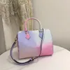 Designer väskor kvinnor tygväska vild på hjärtmonogram empreinte handväskor läder gradient kvinna lyx multicolor speedy crossbody axel väska