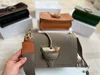 حقائب السهرة المثلث قفل حقائب الكتف المرأة حقيبة يد جلدية مصمم العلامة التجارية Crossbody أنثى حامل البطاقة في الخارج