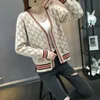 Kvinnors tröjor Nya 2021 Autumn Women Plaid stickade tröjor Knappar Cardigans harajuku långärmad koreansk college stil stickad dam topps kvinna T220925