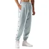 Pantaloni da uomo con bottoni strappati Casual Splicing Pantaloni sportivi da allenamento per basket con tasche Masculinas Pantalon