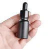 Bouteilles d'huile essentielle en verre noir mat Flacon compte-gouttes avec capuchon en aluminium anodisé brillant 5 ml 10 ml 15 ml 30 ml 50 ml 100 ml SN4903