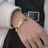 Pulseiras de grife Pulseiras com charme de luxo Feminino Pingente Carta Jóias Banhado a ouro 18K Pulseira de aço inoxidável Punho Acessórios de moda Carta