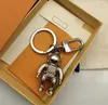 مصمم SPACEMAN KEY RING رسالة عالية الجودة ملحقات سلسلة مفاتيح معدنية للجنسين الفضية الفضية الكلاسيكية فتحة الزجاجة الافتتاحية Robot Car K233S