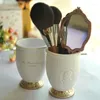 Boîtes de rangement Portrait Portrait Makeup Brush Set Bucket Desktop Beauty Tube Lipstick Glaze Glaze Cash Table Cosmetic