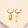 Boucles d'oreilles Charm Designer Lock Key Asymétrique Ear Stud Luxury Huggie Brand Femmes Gold Oreille d'oreille Bijoux de mariage ACCESSORI9527094