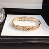 Designer-Charm-Armband, Luxus-Armband, Damen-Buchstabenschmuck, Armband aus vergoldetem Edelstahl mit 18 Karat Gold
