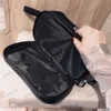 Diseñadores Componen Accesorios Empaquetado Cajas de almacenamiento de maquillaje de moda para mujeres Letras de marca Organizadores de viaje impresos Bolsa de maquillaje de lujo