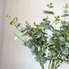 長い枝と葉を備えた装飾花の人工花の配置シミュレートされた植物絹の葉の家の装飾