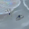 Brincos de costas Tamulo de cristal azul brilhante Taxada de manguito não piercing Brinco de clipe para mulheres estrela de strô Jóias de piercing de cartilagem falsa