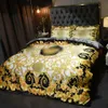 Juegos de cama de diseñador de patrón de lujo 4 unids / set funda de edredón de tamaño queen king de seda con estampado dorado fundas de almohada de moda