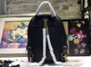 高品質の女性の男性ダブルバックパックラグジュアリーデザイナーバッグ2022スクールショルダーバッグファッション漫画旅行バッグ