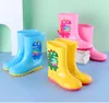 Bottes de pluie imperméables en PVC pour enfants, chaussures d'eau mi-mollet, en caoutchouc souple, antidérapantes, pour filles et garçons