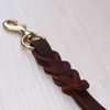 Colliers pour chiens Laisses Une étape Laisse courte pour chien Tressé Ceinture de traction en cuir véritable Antidéflagrant pour animaux de compagnie Laisse d'entraînement à la marche pour chiens de taille moyenne et grande 220923