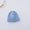 M514 Autumn Winter Baby barn stickad hatt för pojkar pojkar tecknad broderi leende kepsar barn skalle mössor varma hattar