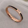 Rose Golden Golden Titanium Steel Polished Epoxy Black Casal Rings Moda Menina Mulheres Anel de noivado de Casamento