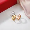 Diseñador de joyas de diamantes anillos de amor de lujo chapado en oro plata para pareja boda dama moda regalos de navidad accesorios simples anillos de banda